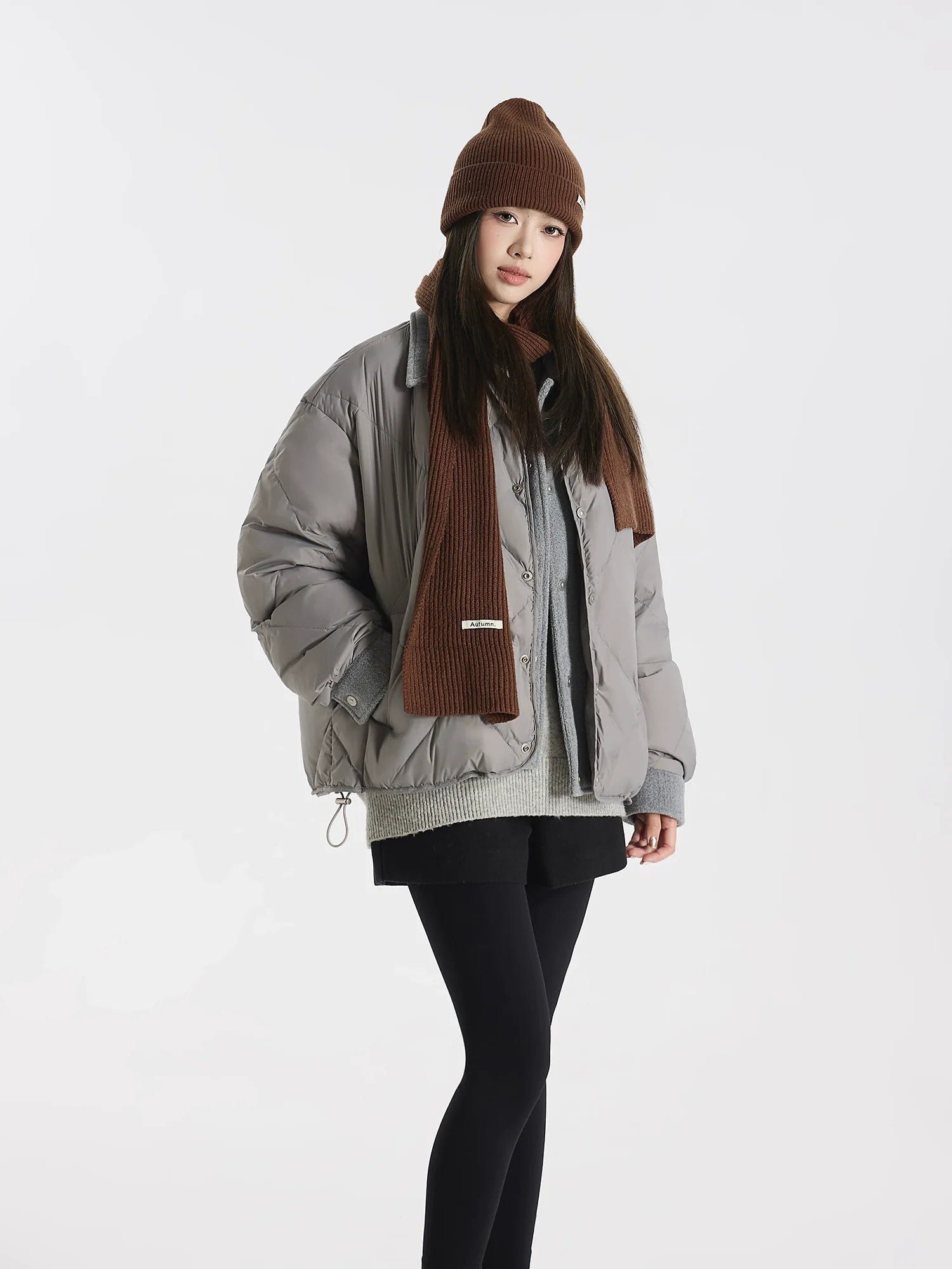 90% 흰색 오리털 양이온 혼방 울 소재를 겹겹이 쌓아 만든 인조 다운 재킷