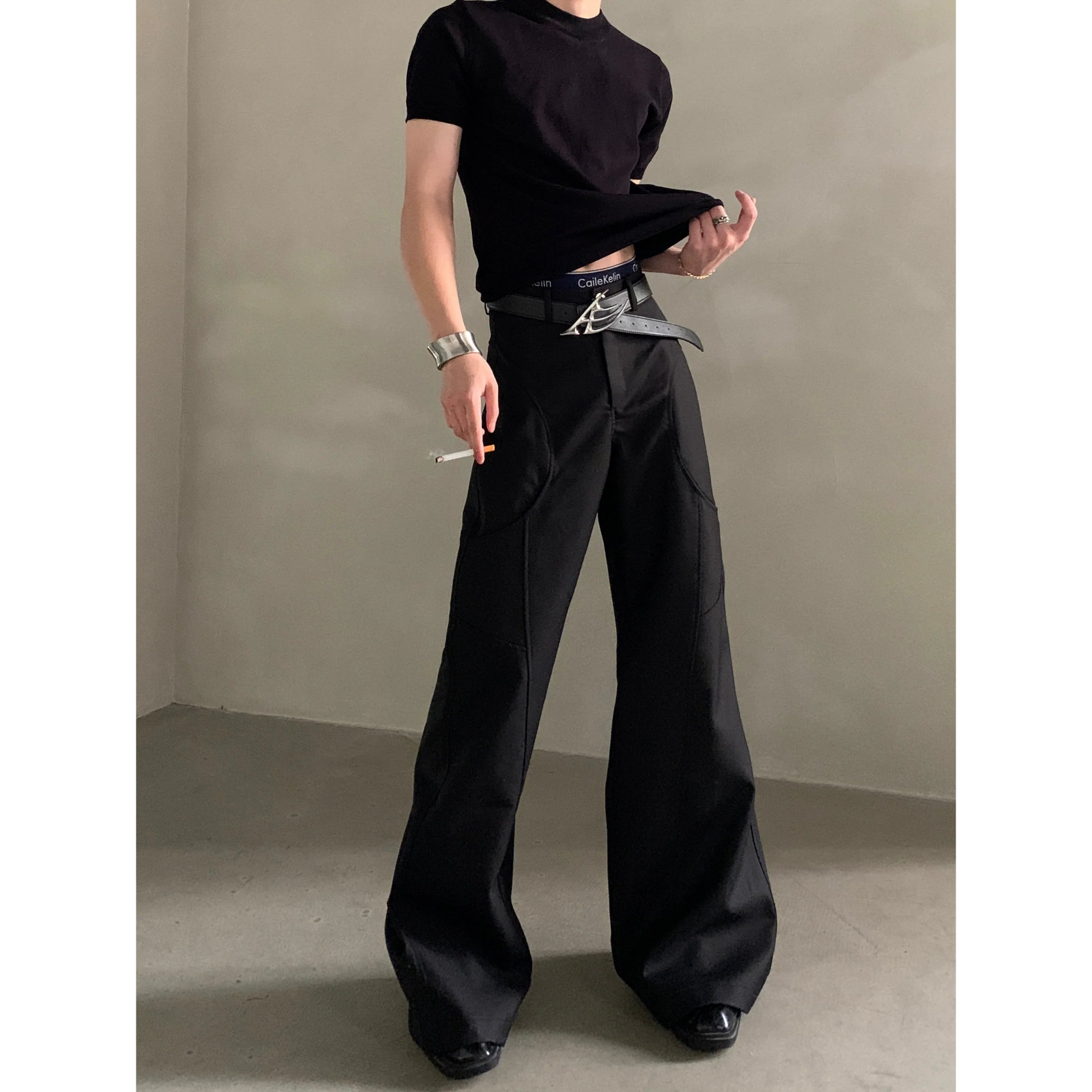 니치 디자인 실루엣 블랙 마이크로 플레어 팬츠 남성용 시니어 감각 클린핏 캐주얼 팬츠 트렌드