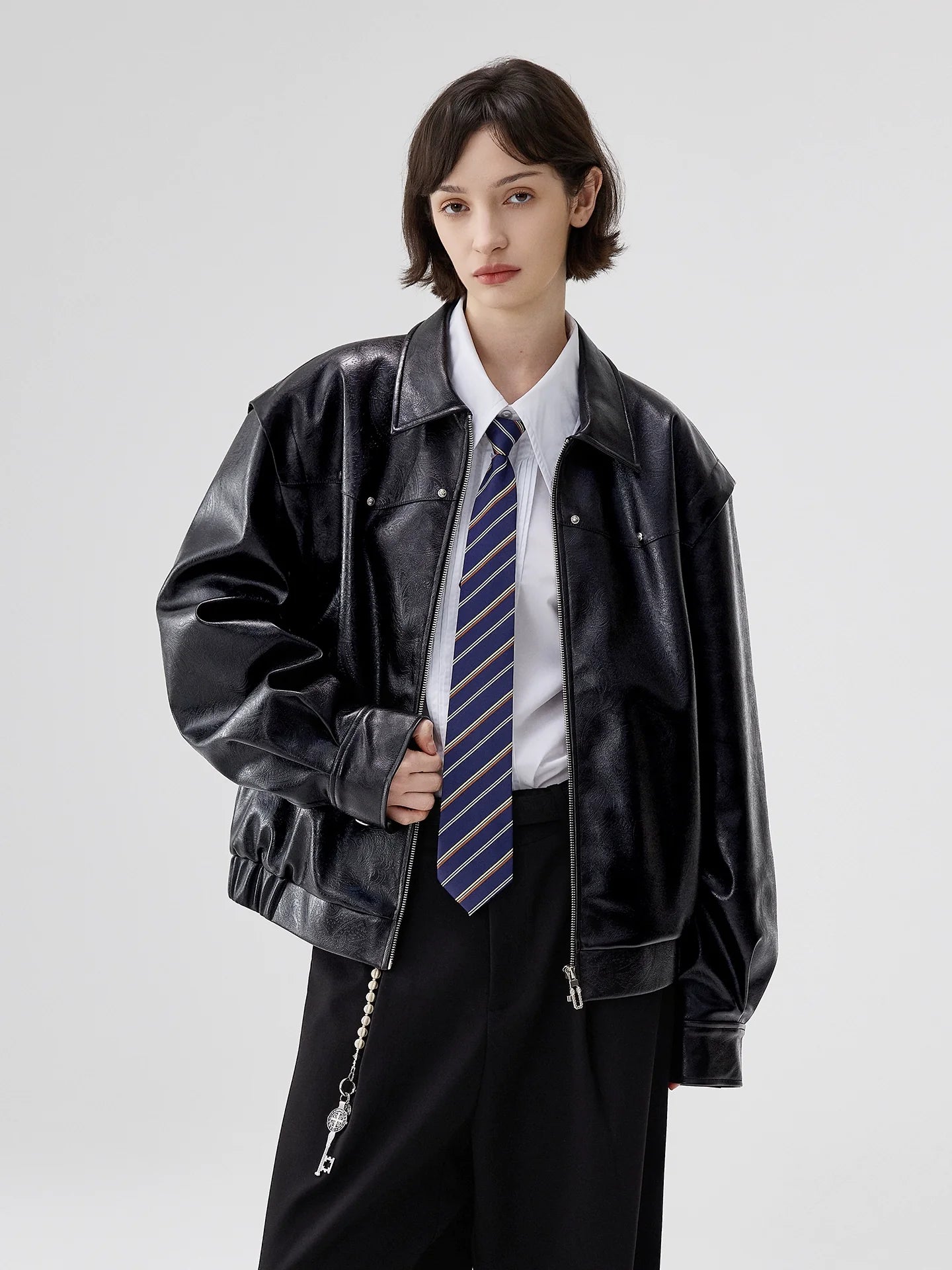 Court embossed silhouette PU leather short jacket men's lapel locomotive leather jacket autumn new