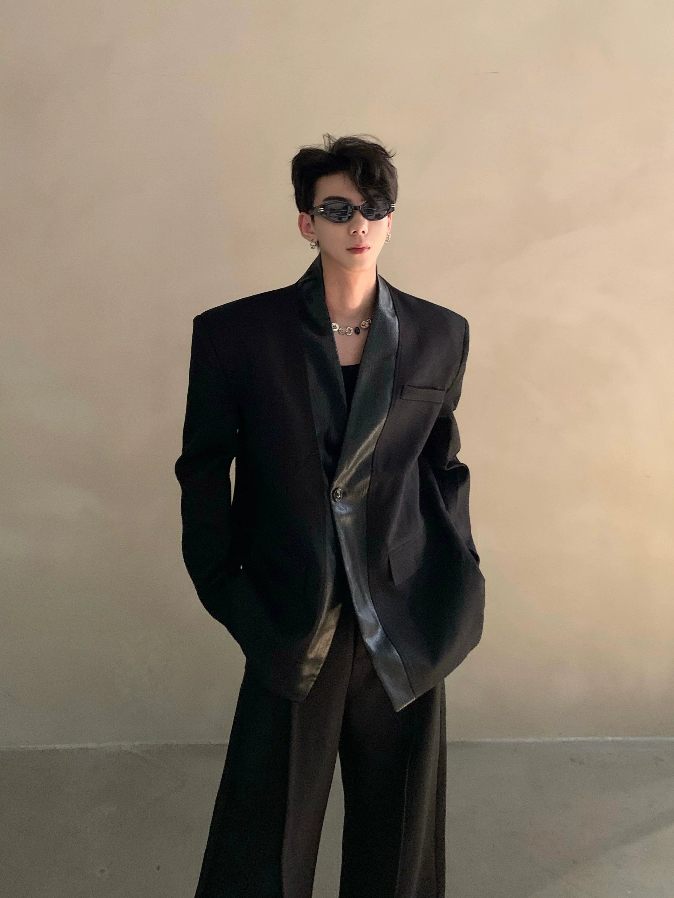 Autumn and winter black collarless suit splicing leather jacket profile shoulder pads light luxury ruffian handsome high-end jacket