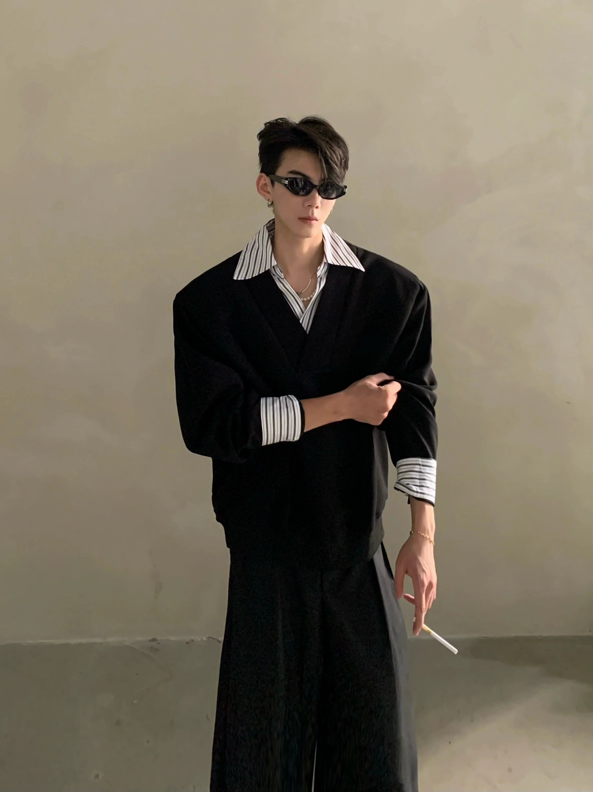 Niche design sense fake two-piece splicing sweater men's high-end sense ruffian handsome shirt collar long-sleeved top