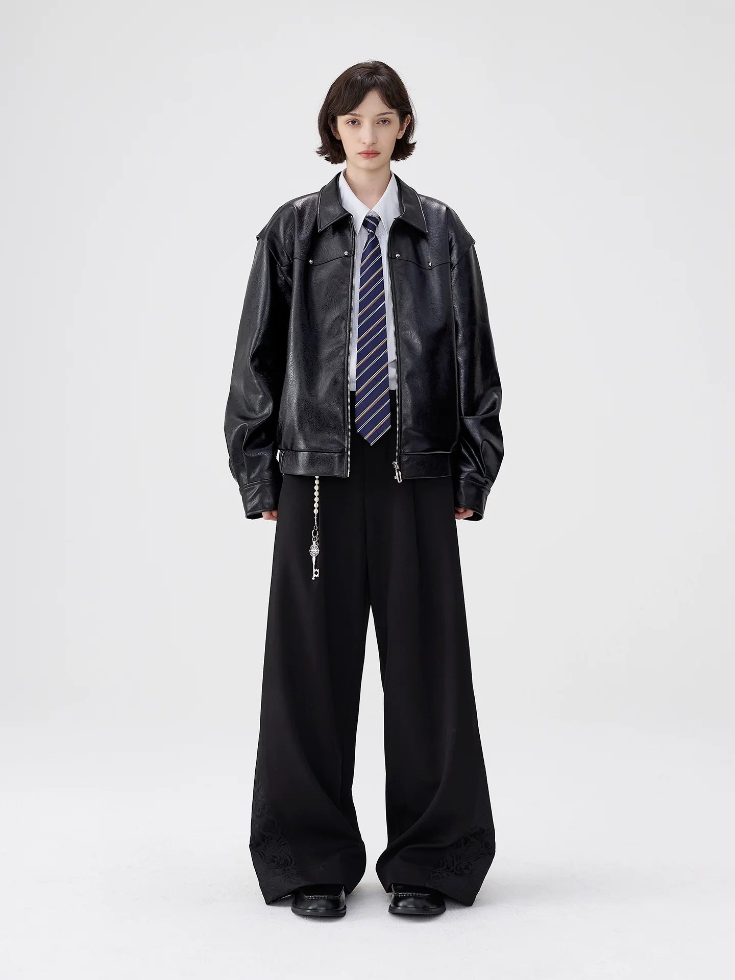 Court embossed silhouette PU leather short jacket men's lapel locomotive leather jacket autumn new