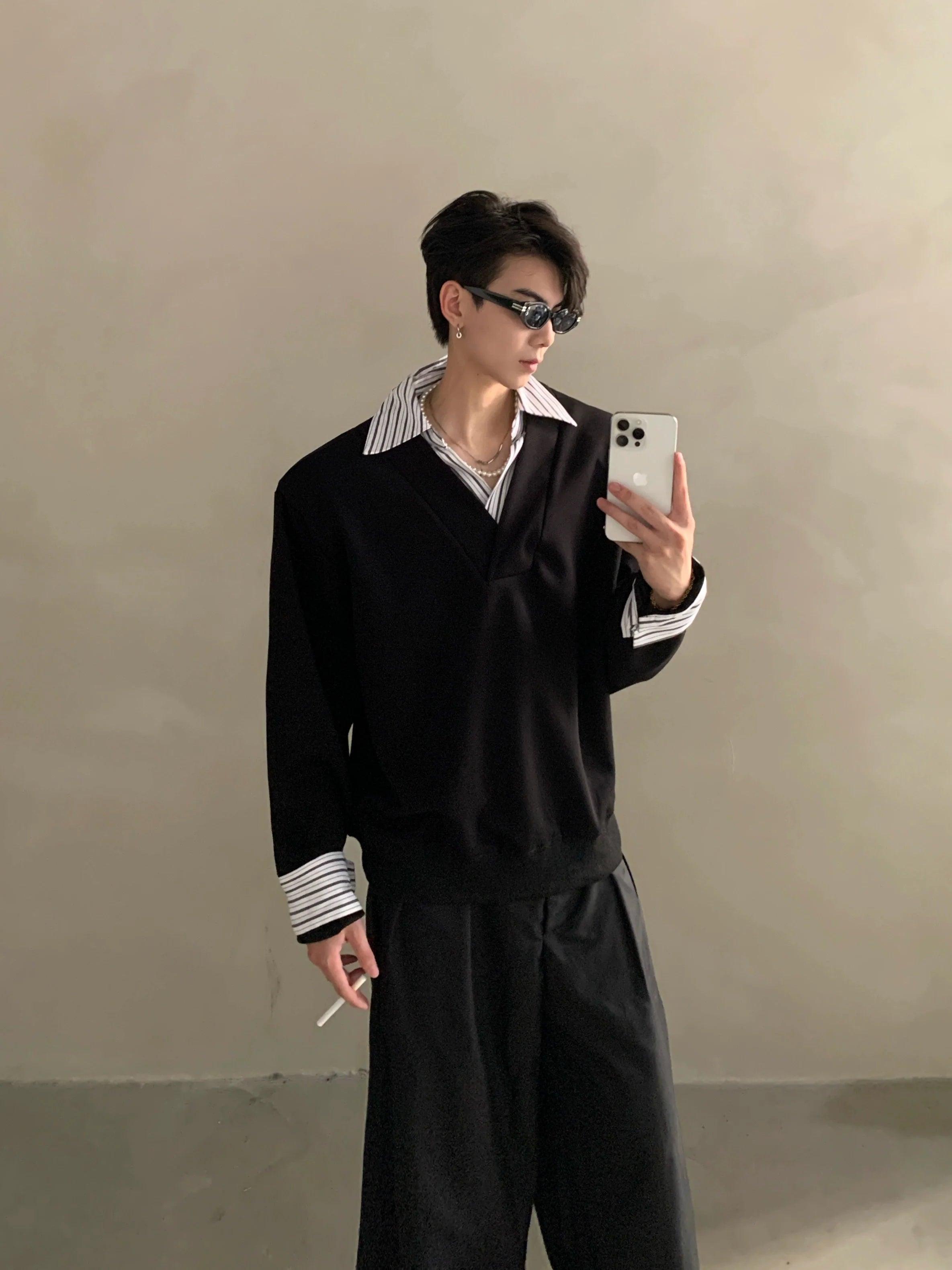 Niche design sense fake two-piece splicing sweater men's high-end sense ruffian handsome shirt collar long-sleeved top