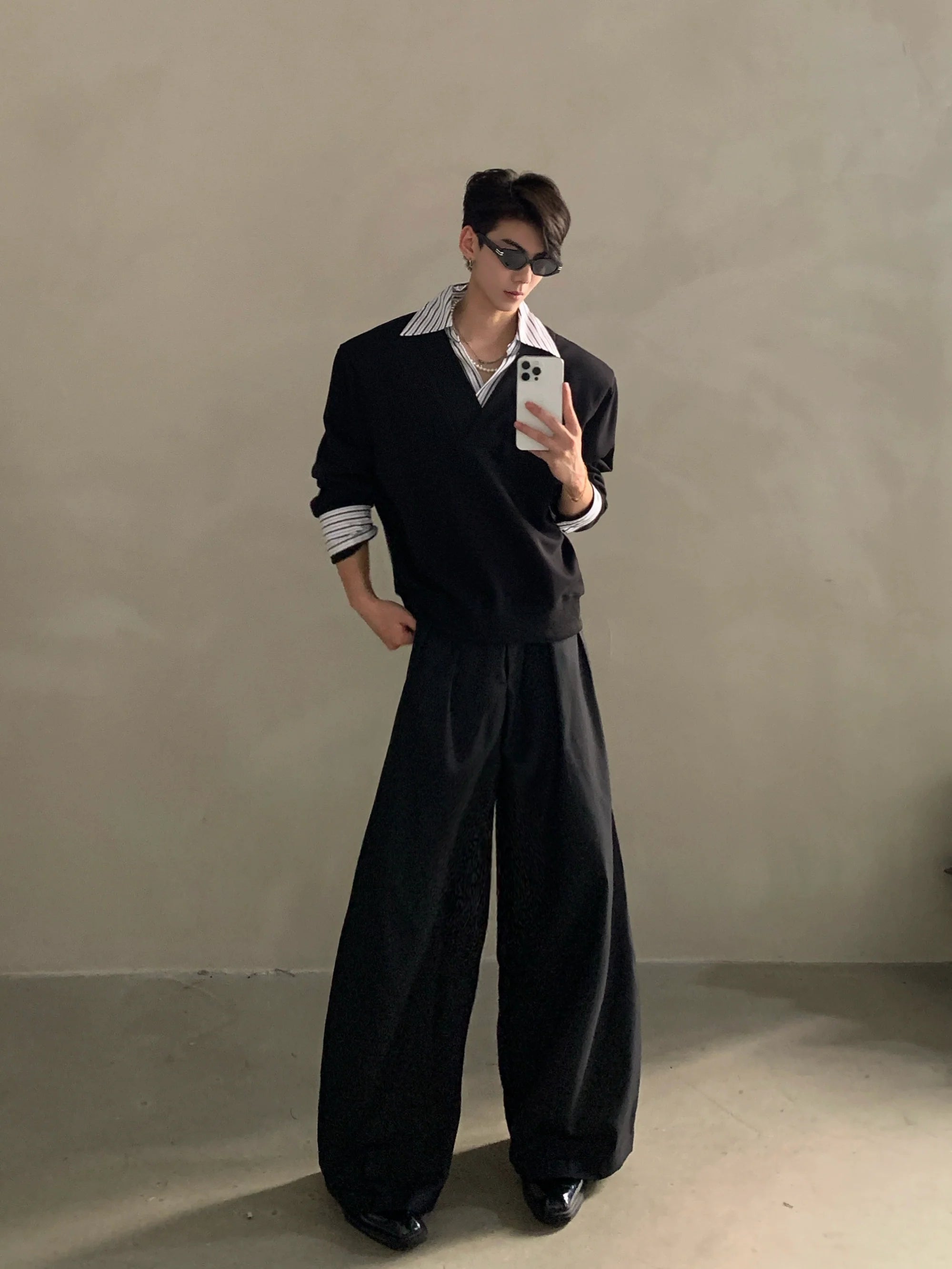 Niche design sense fake two-piece splicing sweater men's high-end sense ruffian handsome shirt collar long-sleeved top