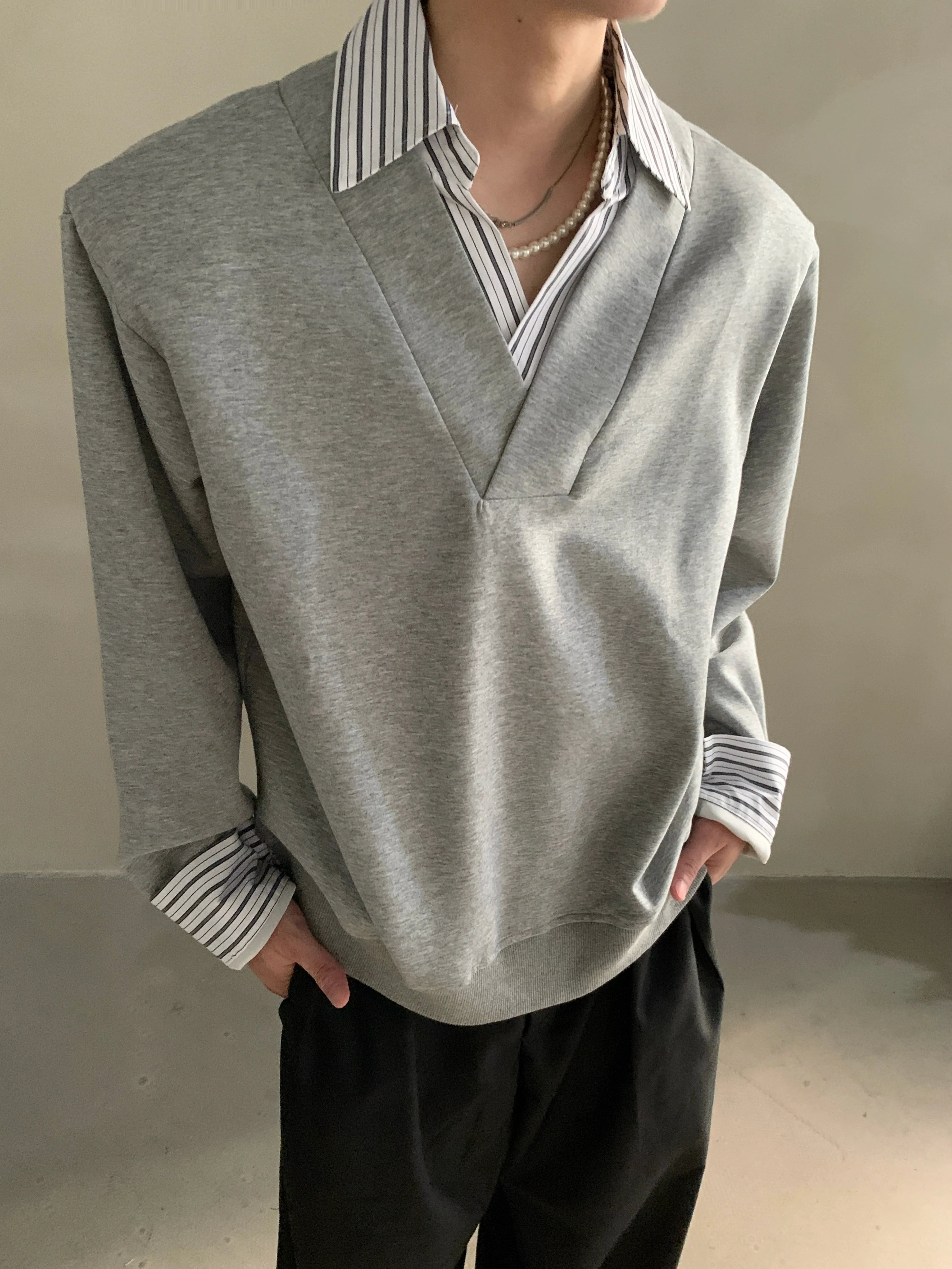 Niche design sense fake two-piece splicing sweater men's high-end sense ruffian handsome shirt collar long-sleeved top