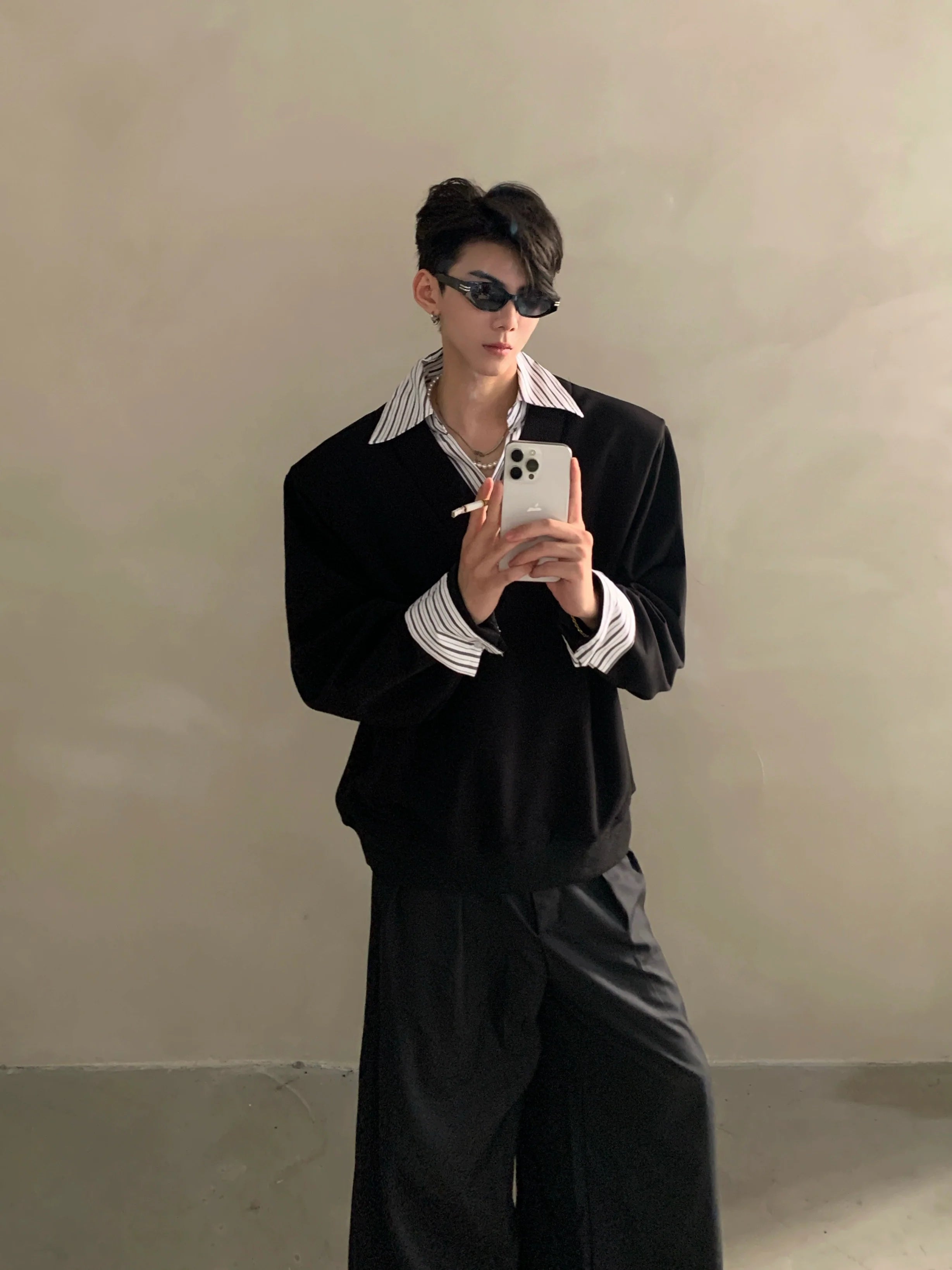 Niche design sense fake two-piece splicing sweater men's high-end sense ruffian handsome shirt collar long-sleeved top